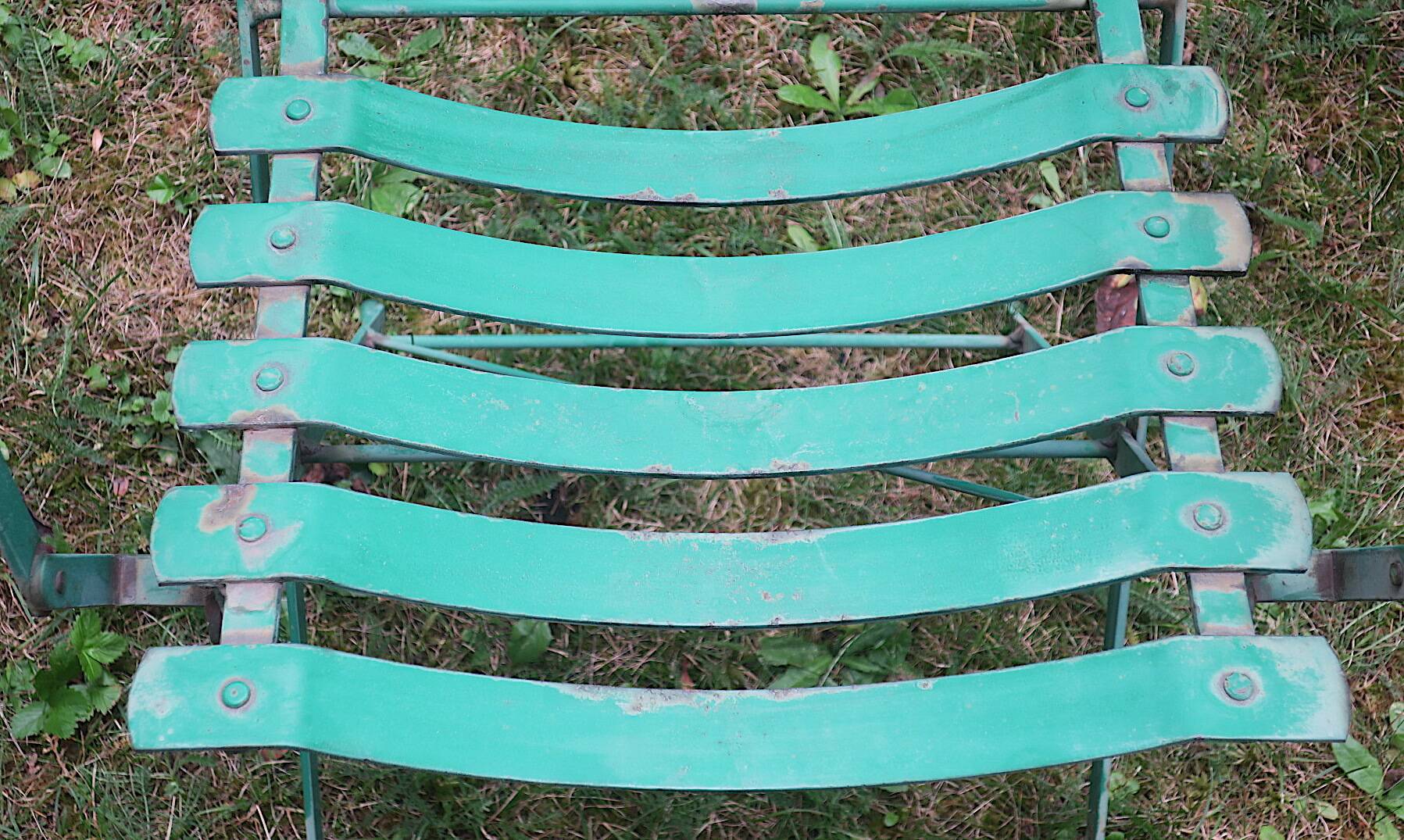 Pair of mid century distressed painted iron garden chairs