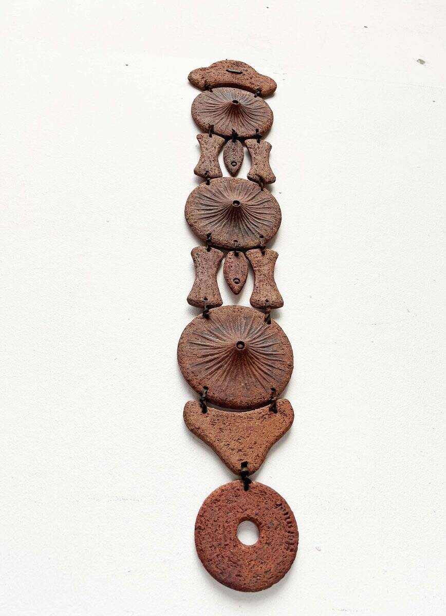 Wall suspension of Danish studio pottery in mid-century brutalist modernist style by Clara Helmich, 1979.