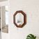 Miroir vintage octogonal en bois massif avec détails sculptés