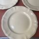 Set of 4 ivory digoin sarreguemines flat plates with gadroons