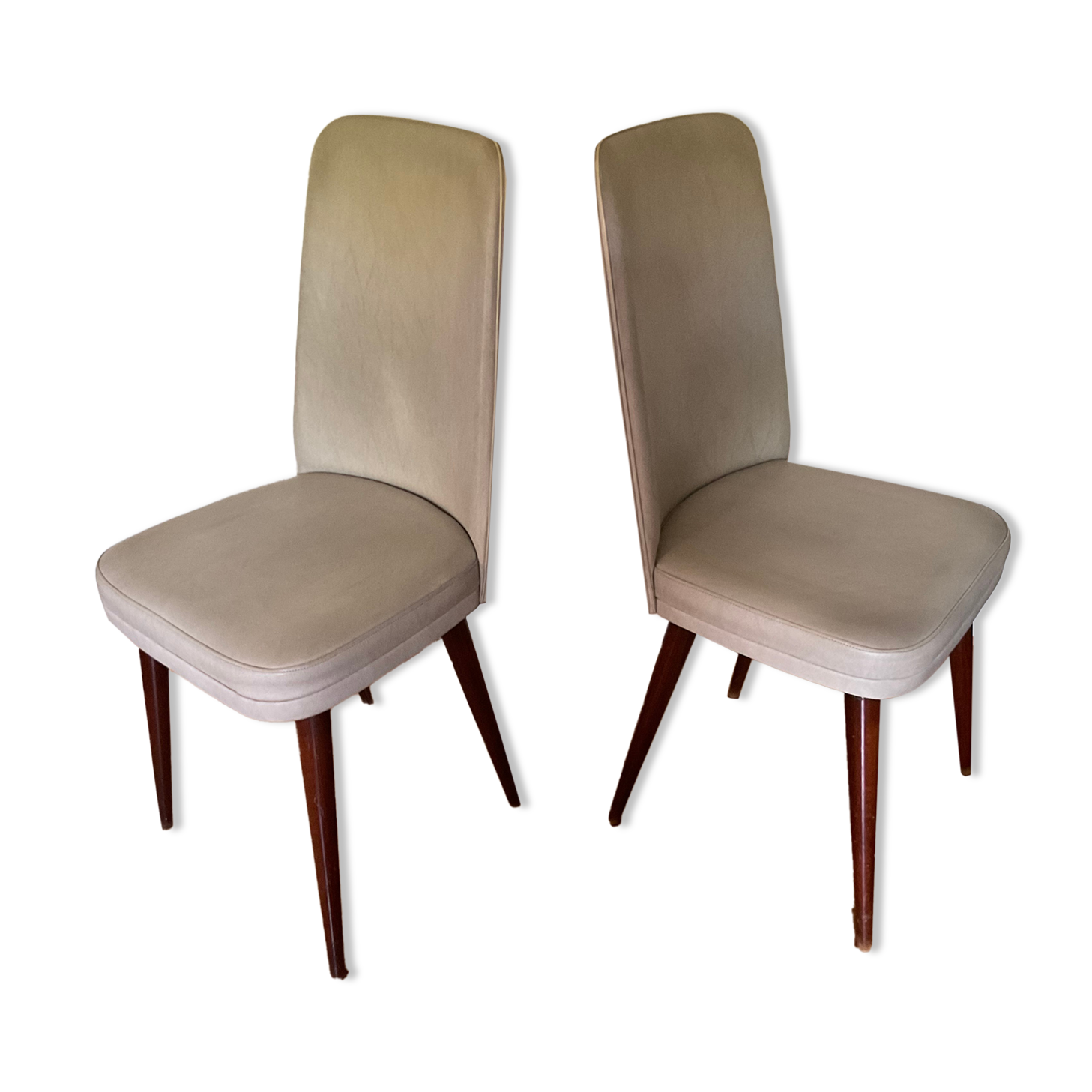 Pair of vintage mahogany and skai chairs