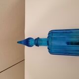 Polished in blue glass