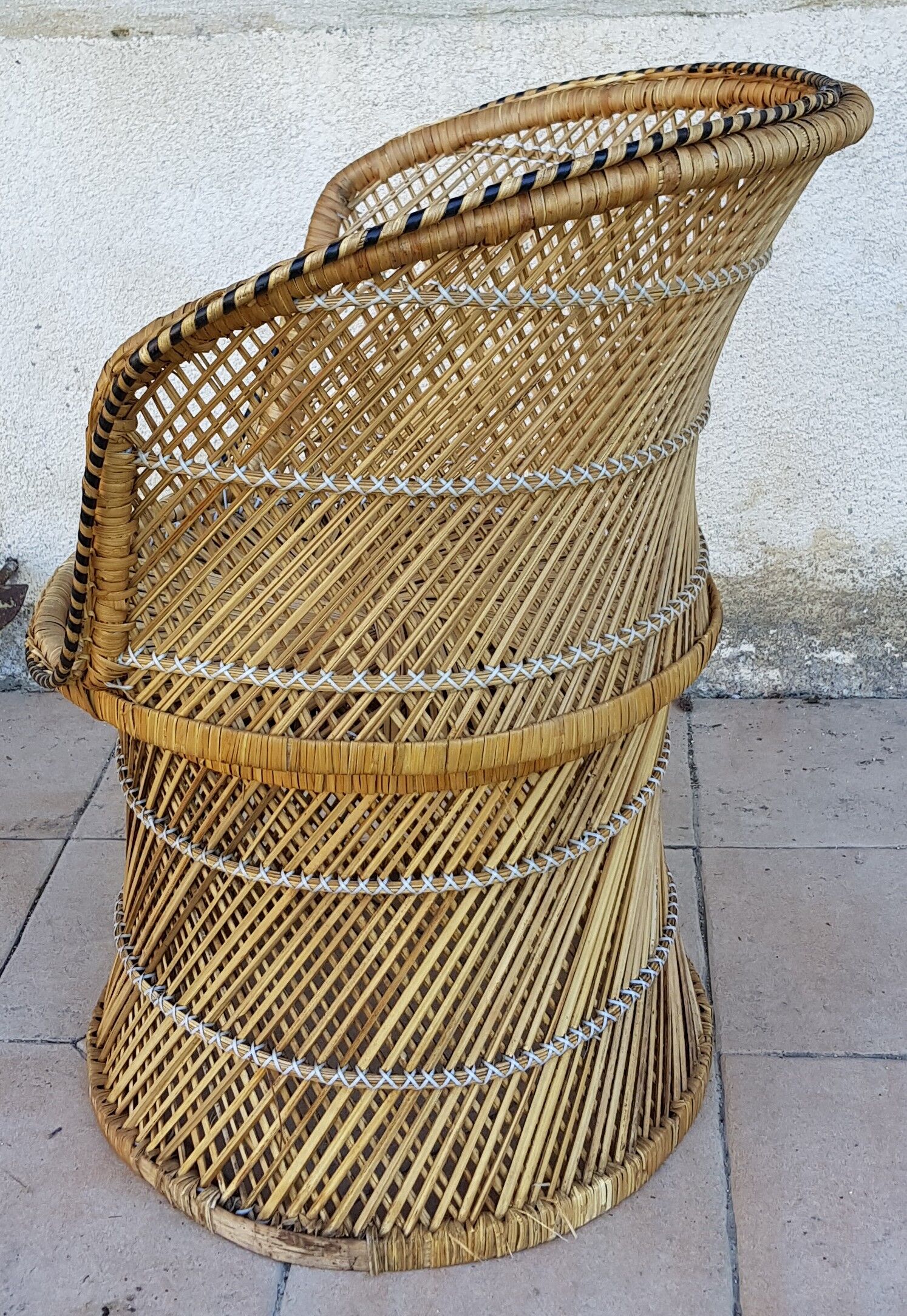 Island-inspired rattan armchair