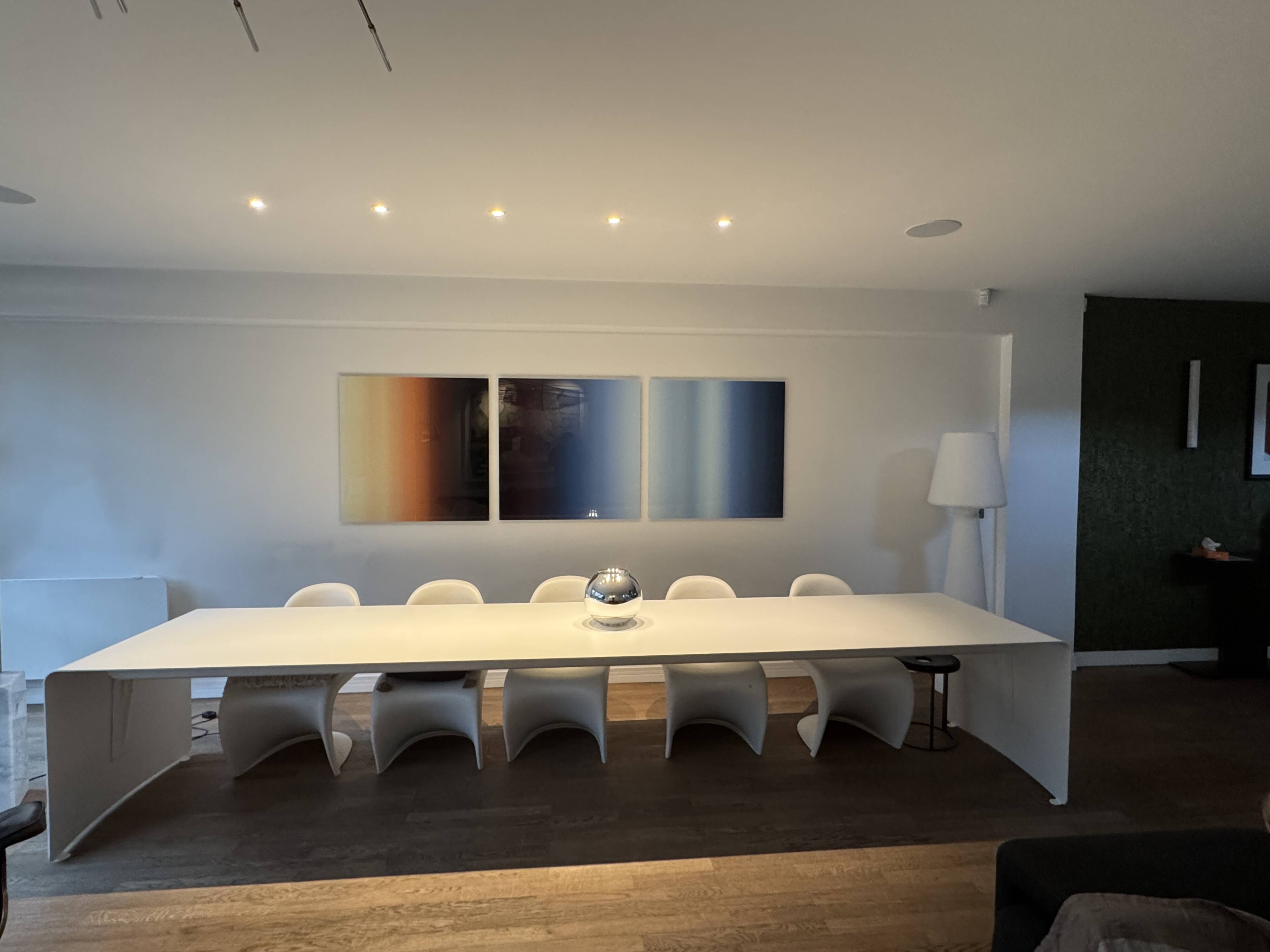 Large curved aluminium tabletop.