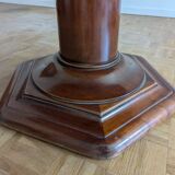 Round table with extendable central leg