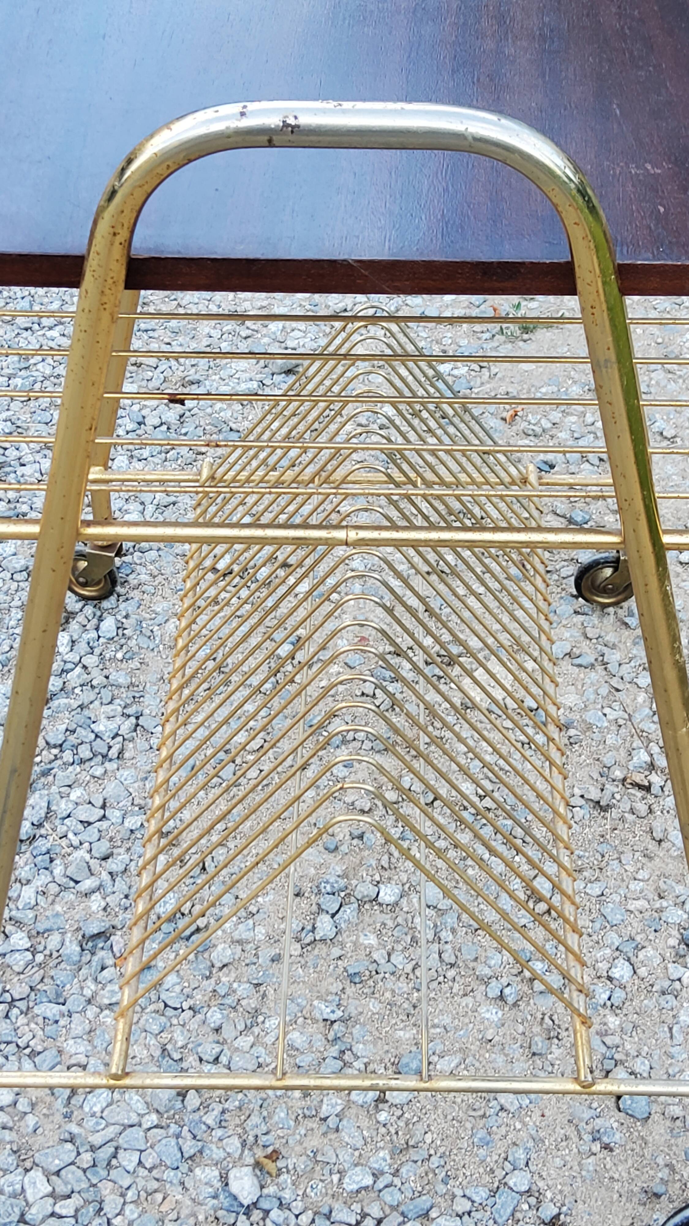 Side table of the 60s mahogany and gold metal range discs