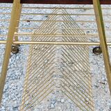 Side table of the 60s mahogany and gold metal range discs