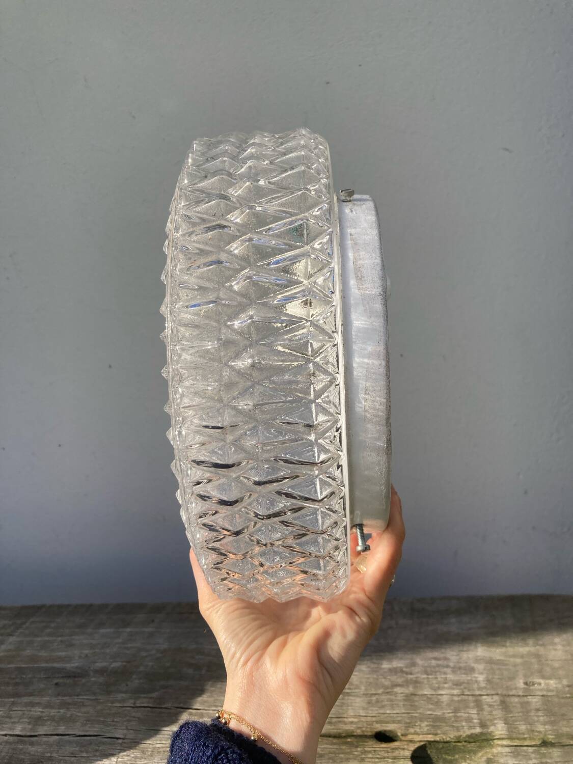 Pair of transparent round glass wall lights