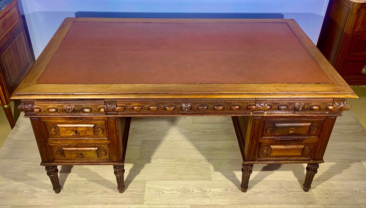 Renaissance style desk in solid oak, richly carved