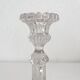 Antique baluster-shaped molded glass candlestick holder