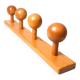 Vintage wall-mounted coat rack in solid pine.