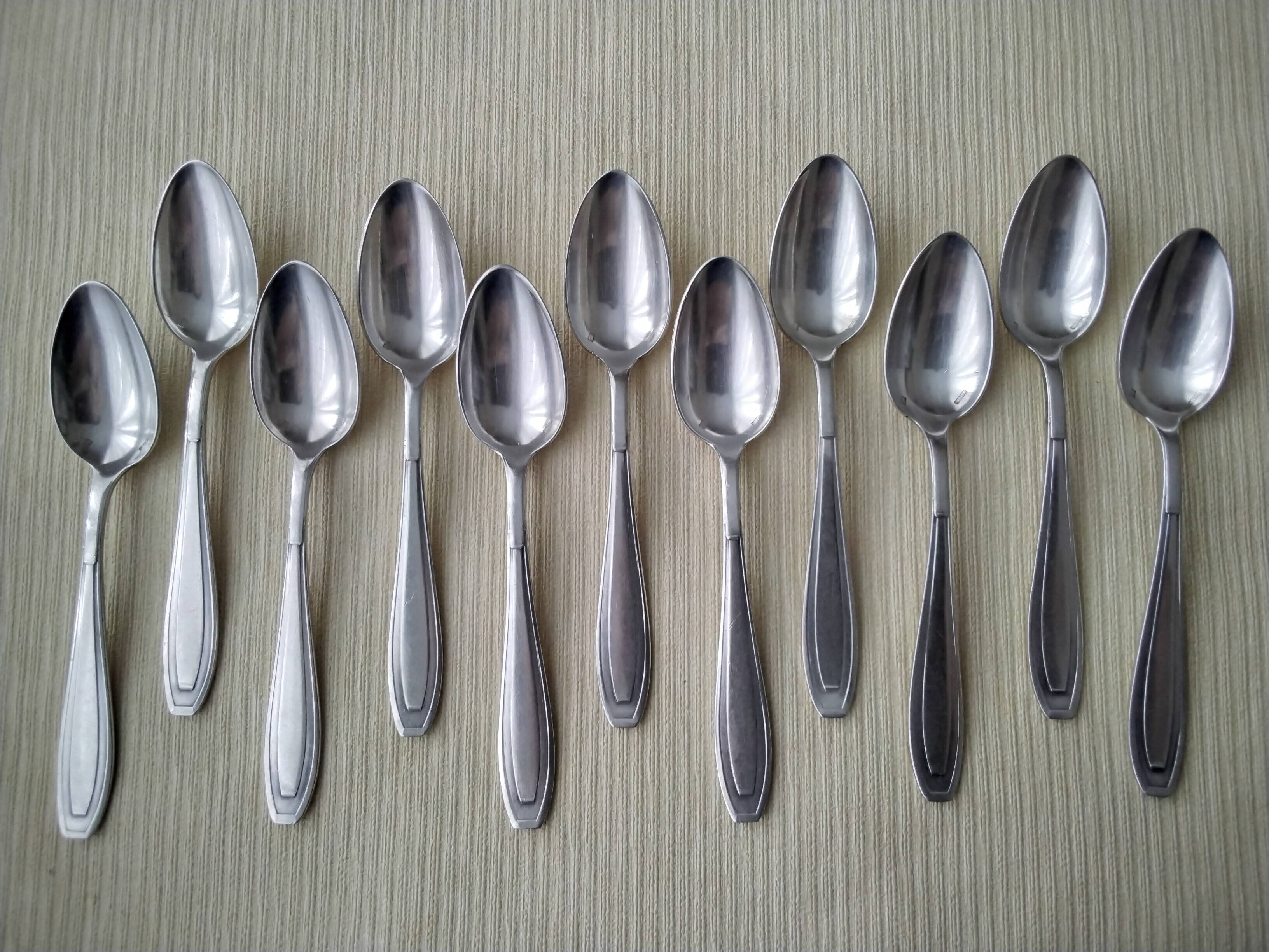 11 Cuillères à café en métal argenté Apollo