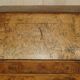 Writing desk in pollard oak from around 1800 with claw and ball carved legs.