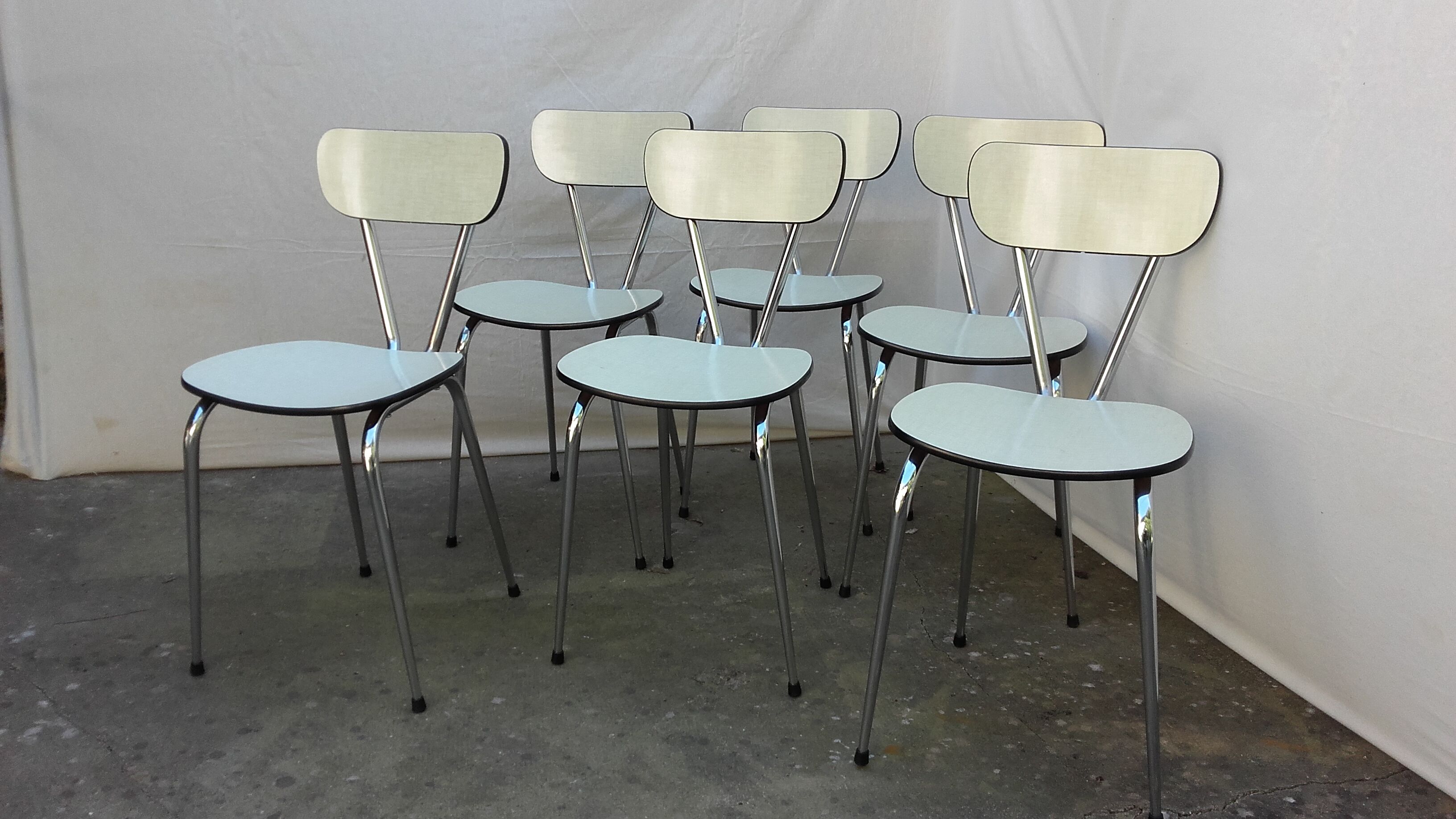 Six ivory formica chairs