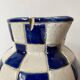 Antique blue and white checkered pitcher
