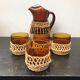 Carafe juice service with 4 orange blown glass glasses + vintage wicker