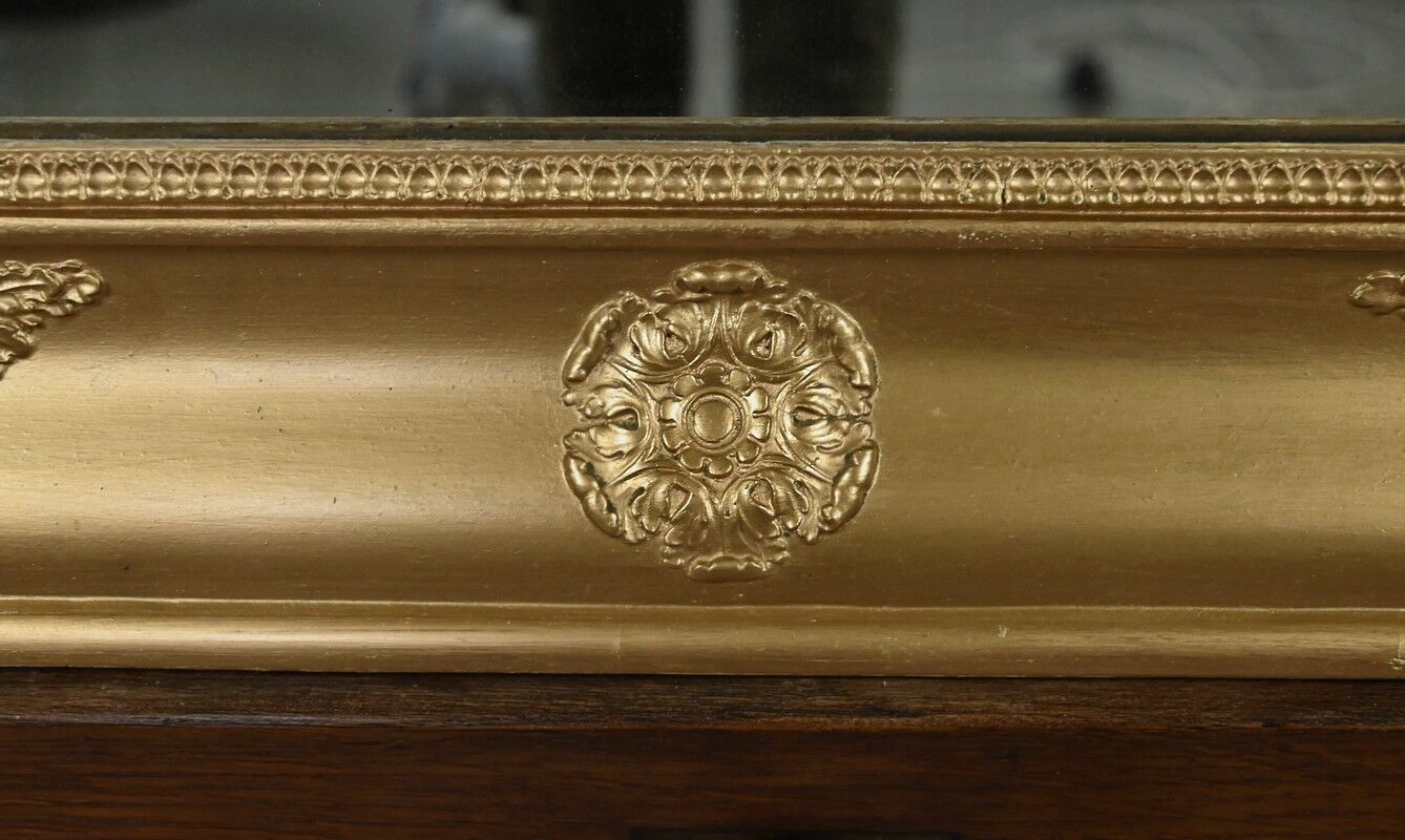 Important miroir en bois doré, style Restauration – Milieu XIXe