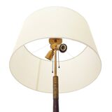 Floor lamp with a brass base and parchment shade, 1940s.