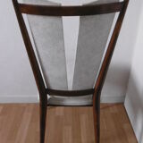 Chair in white leatherette of 60-70 years