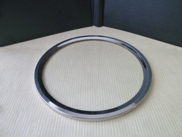 Glass and silver metal underside