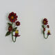 Pair of vintage Italian wall lamps in painted sheet metal. Decoration flowers. Year 50 60
