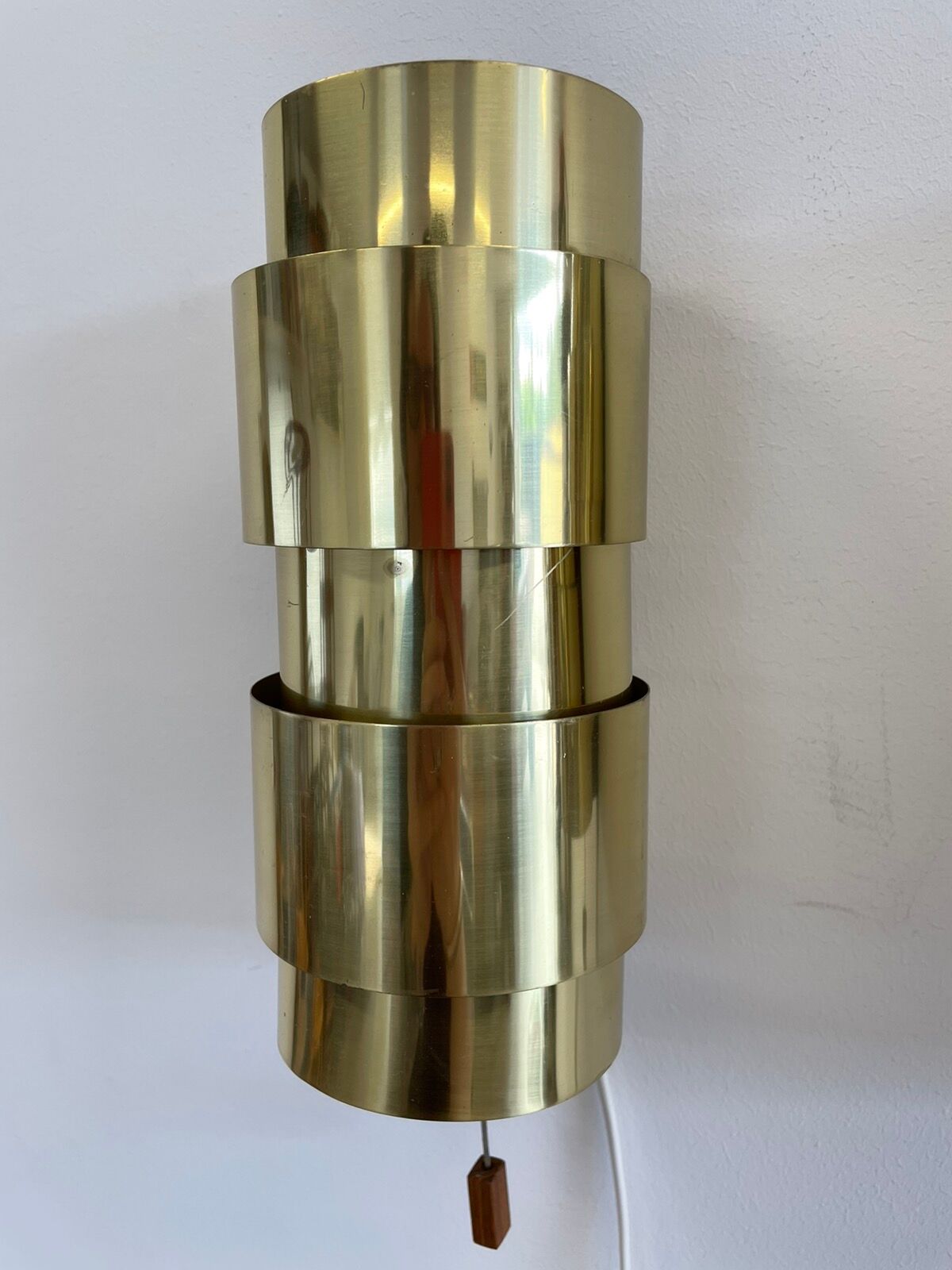 Pair of Scandinavian teak and brass sconces