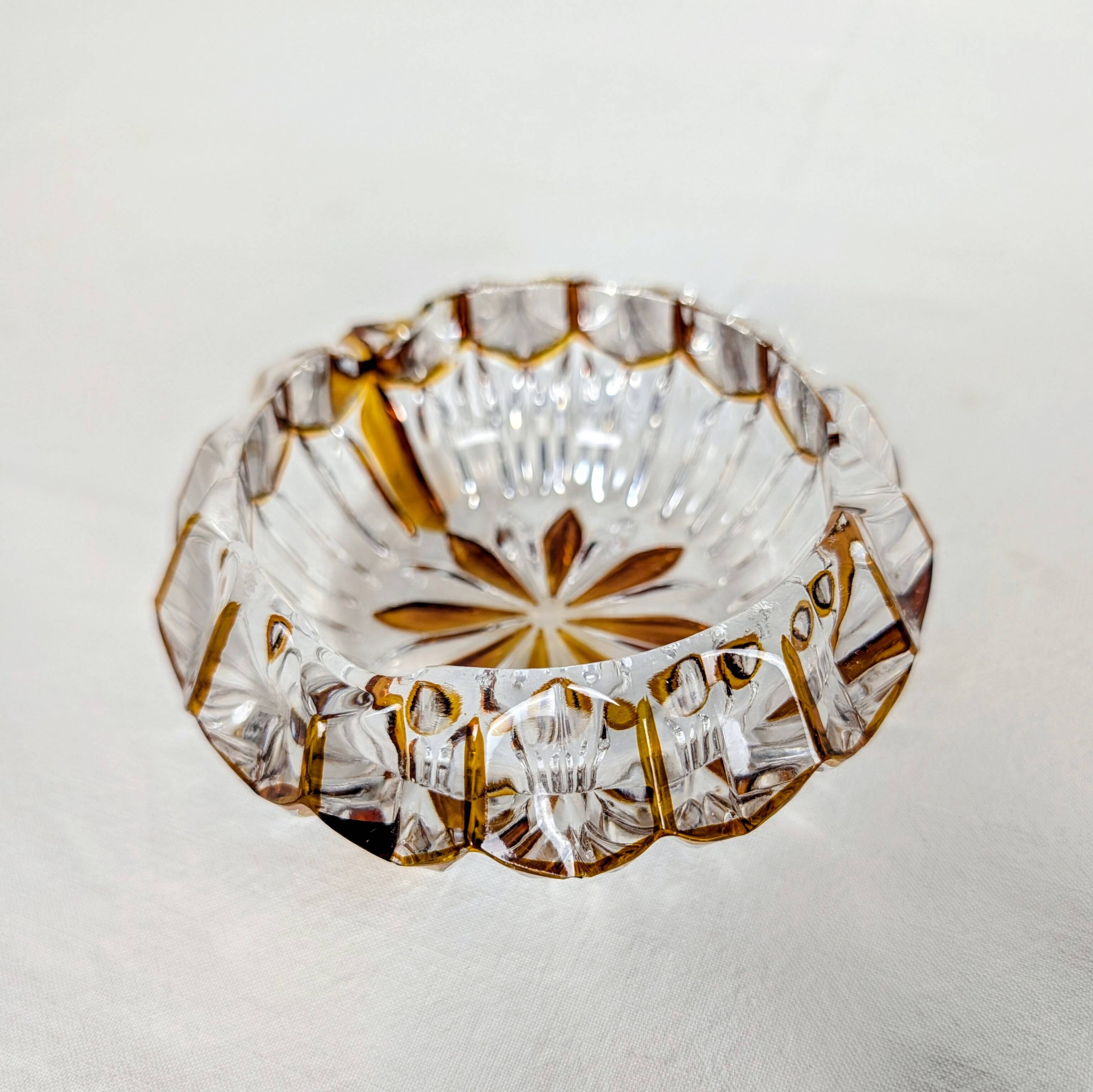 Cut glass ashtray with amber pattern