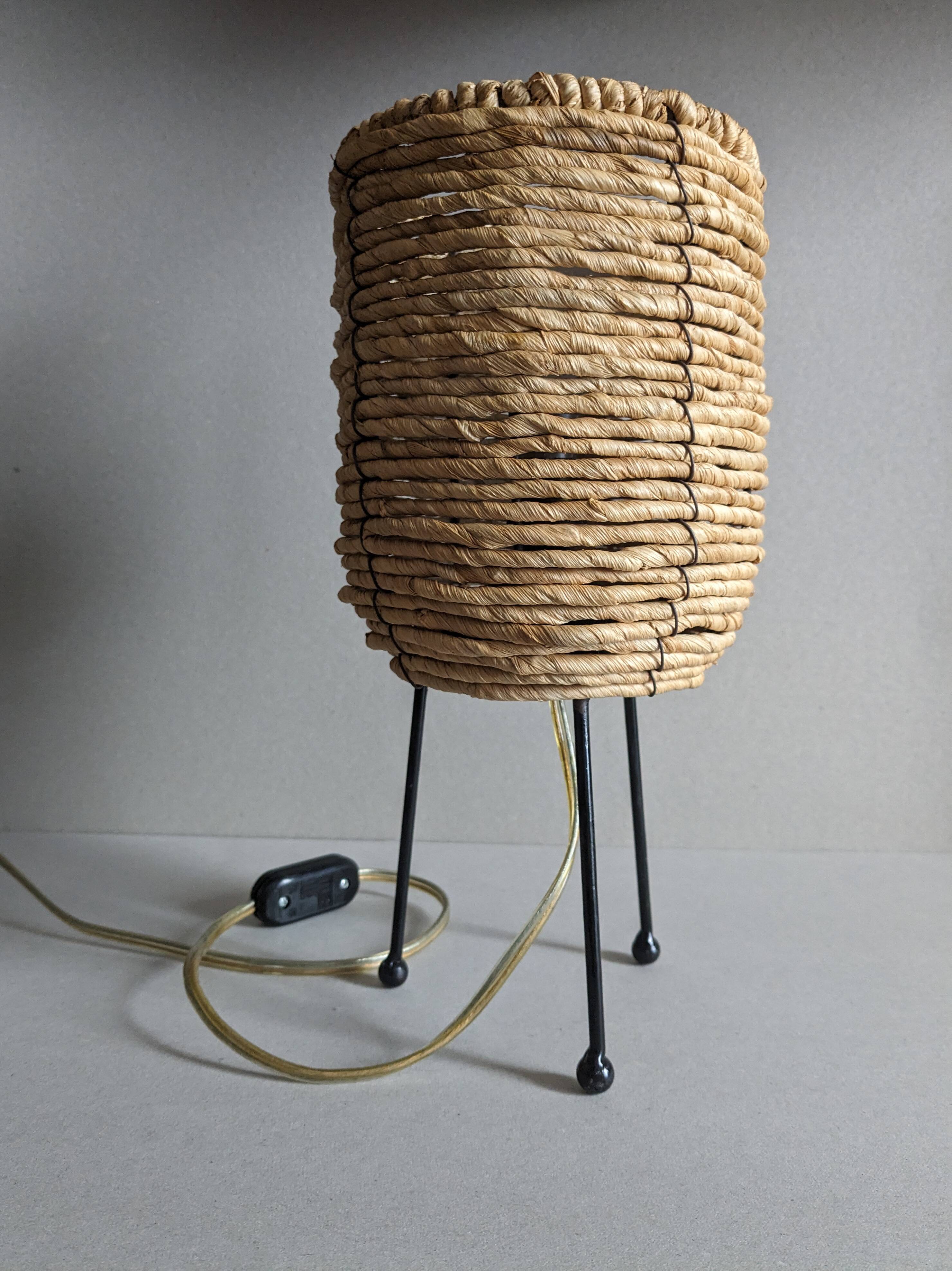 Fiber and metal tripod lamp