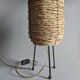 Fiber and metal tripod lamp