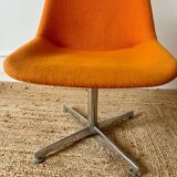 Chrome metal chair with orange fabric from the 70s.