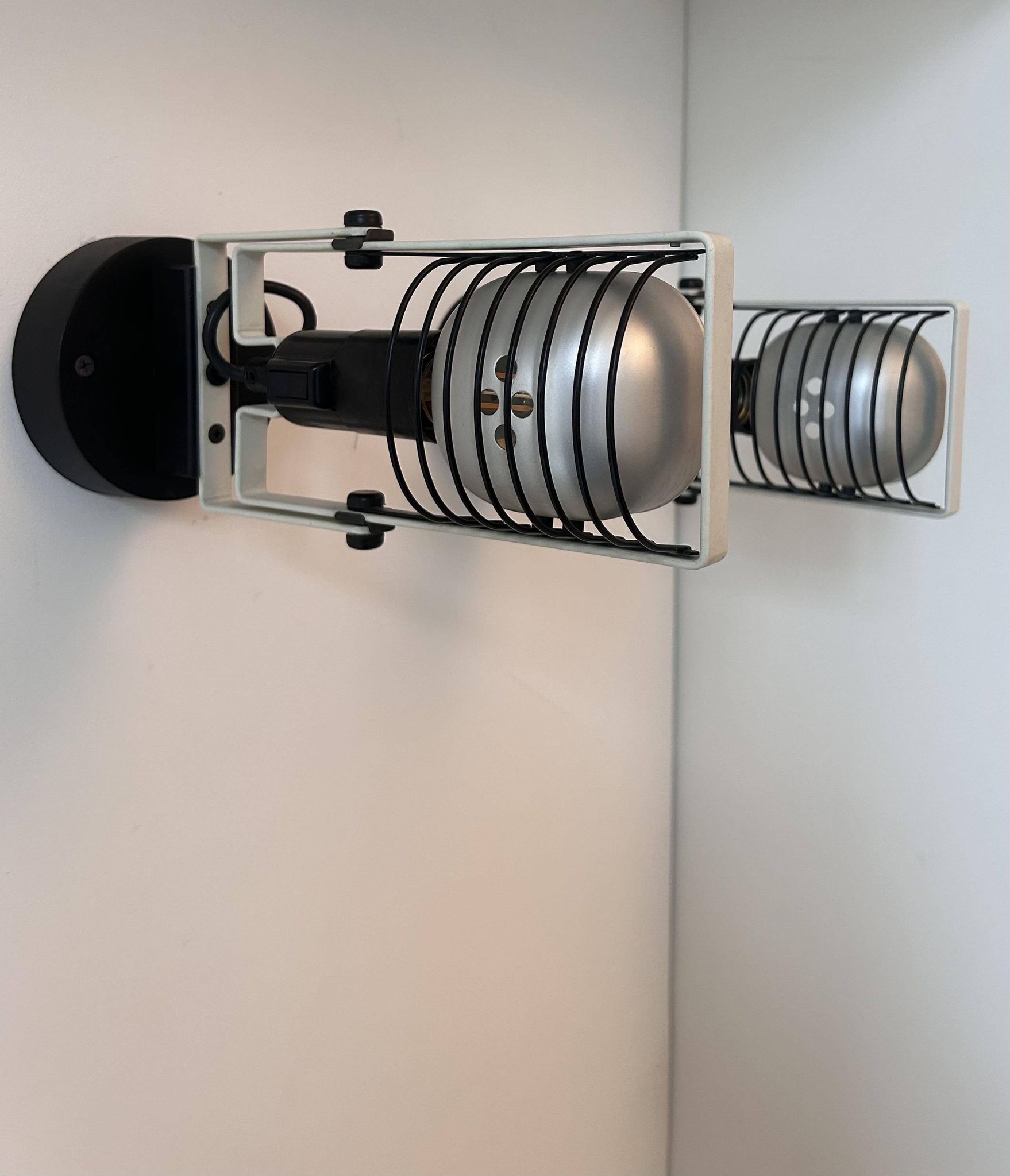 Pair of vintage Sintesi adjustable wall lights, by Gismonti for Artemide, Italy 1975