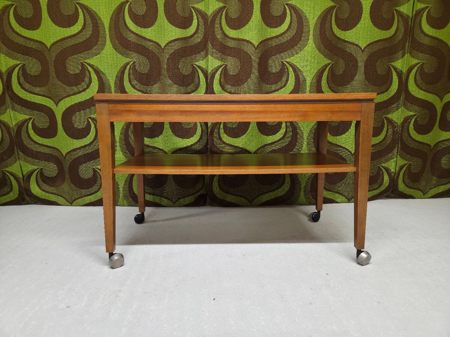 Teak serving table with casters, 1970s