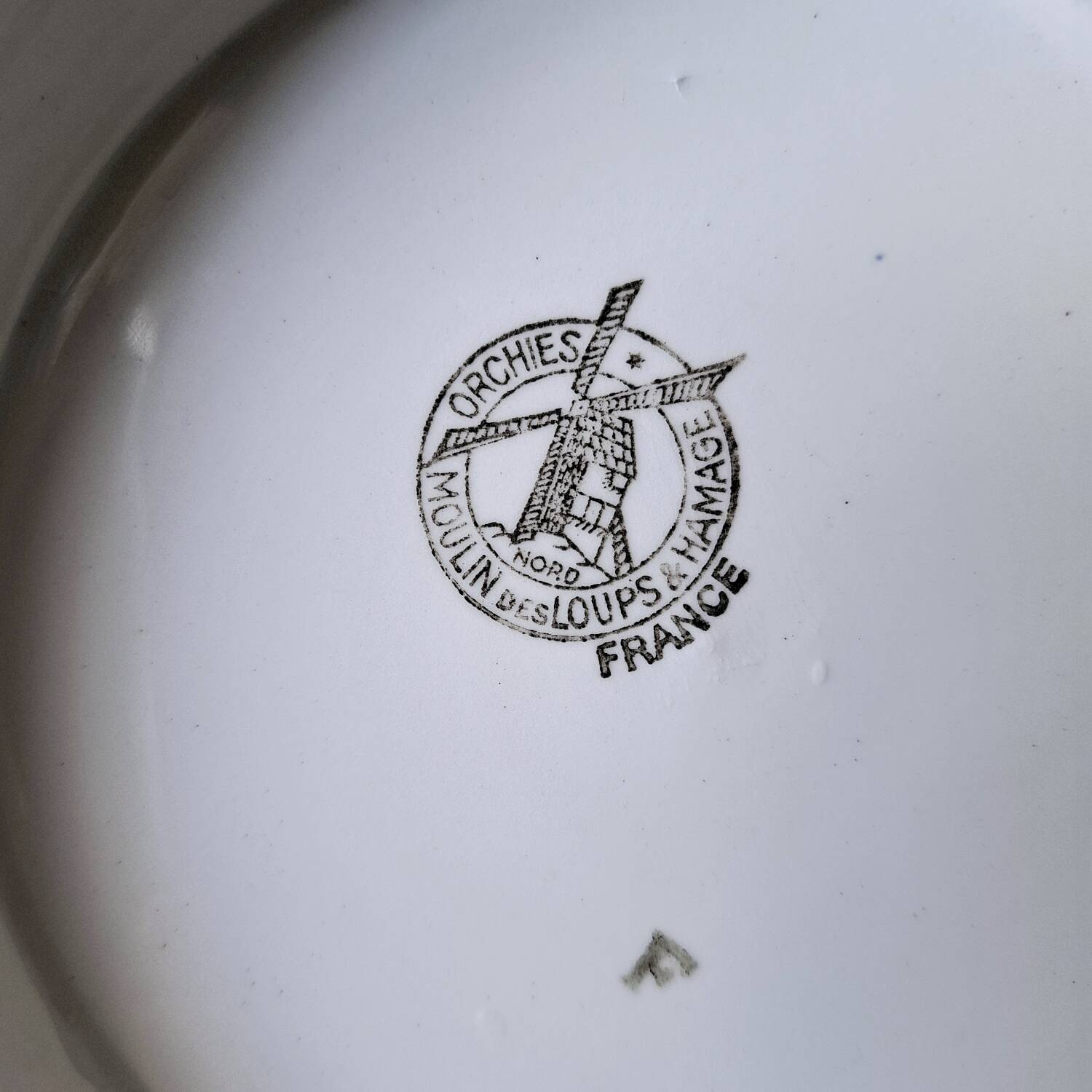 Old mounted earthenware plate