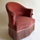 Pink-orange velvet tub chair