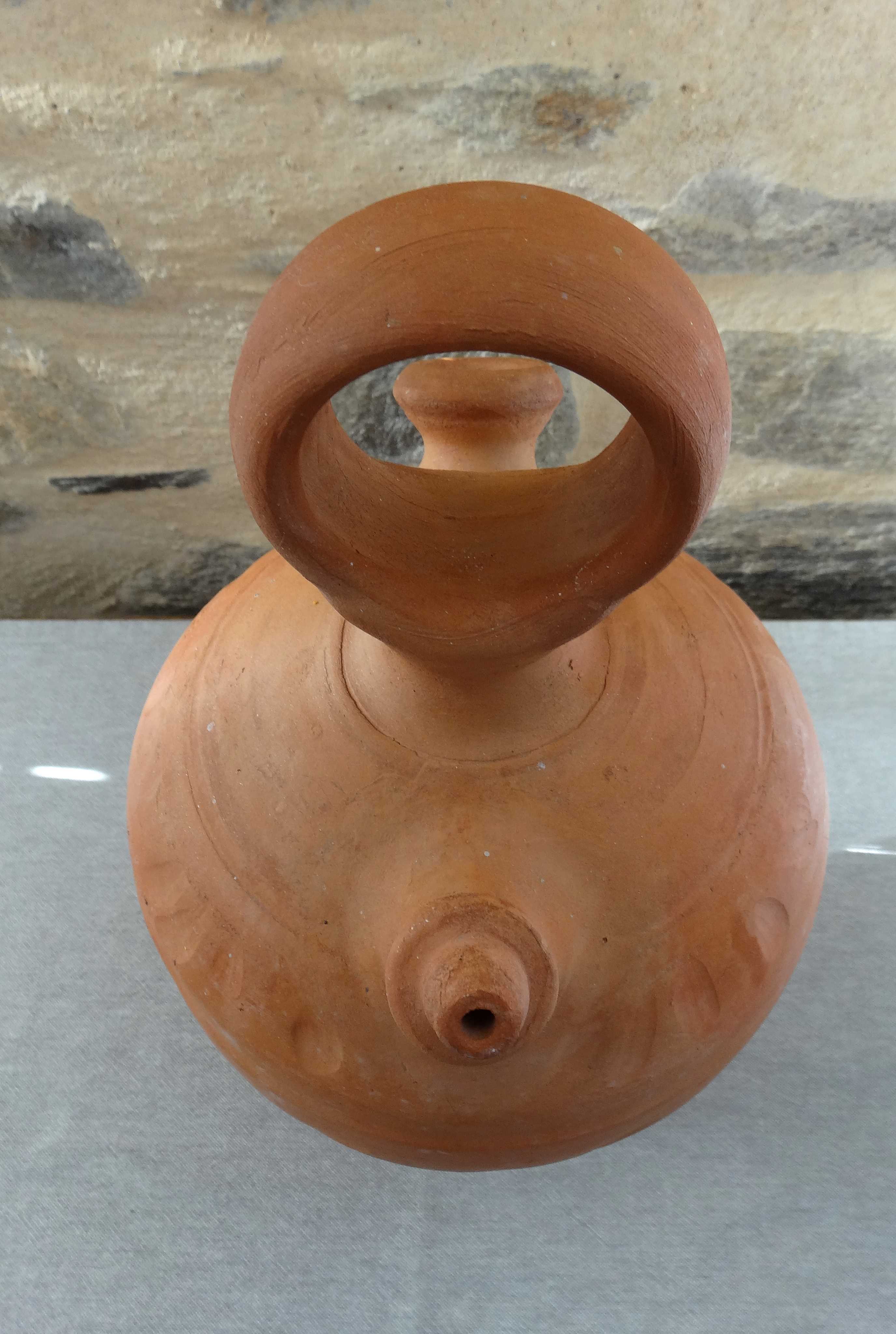 Gargoyle / terracotta water jug