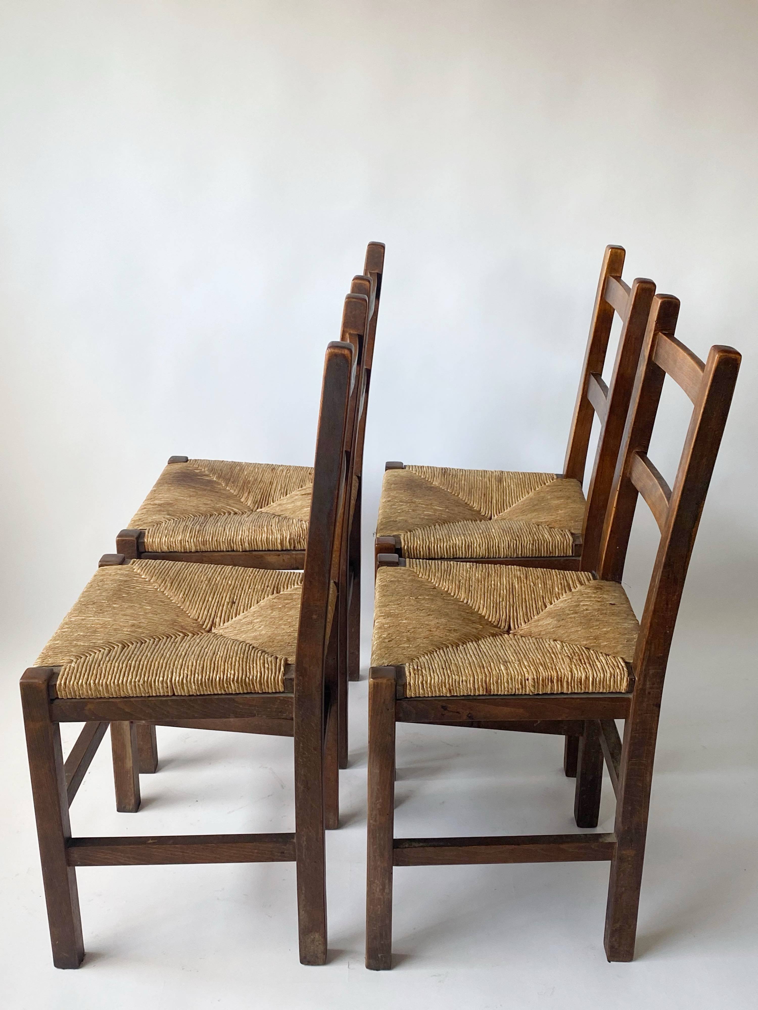4 wooden and straw country chairs