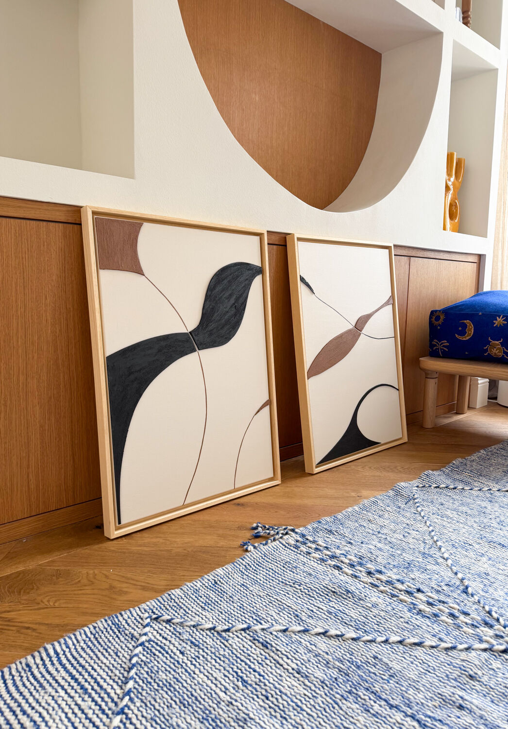 Beige, black, brown diptych design panels.