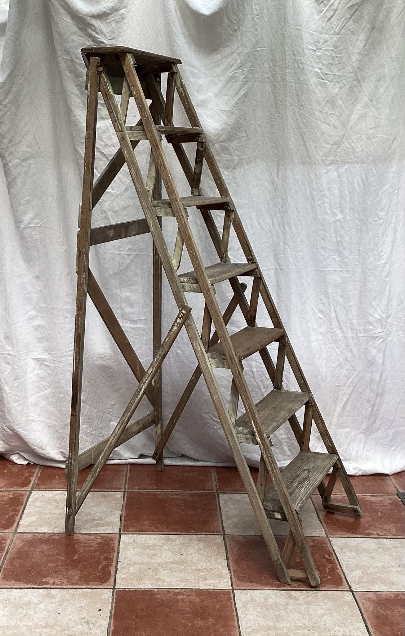 Wooden painter's stepladder in the middle of XX century foldable