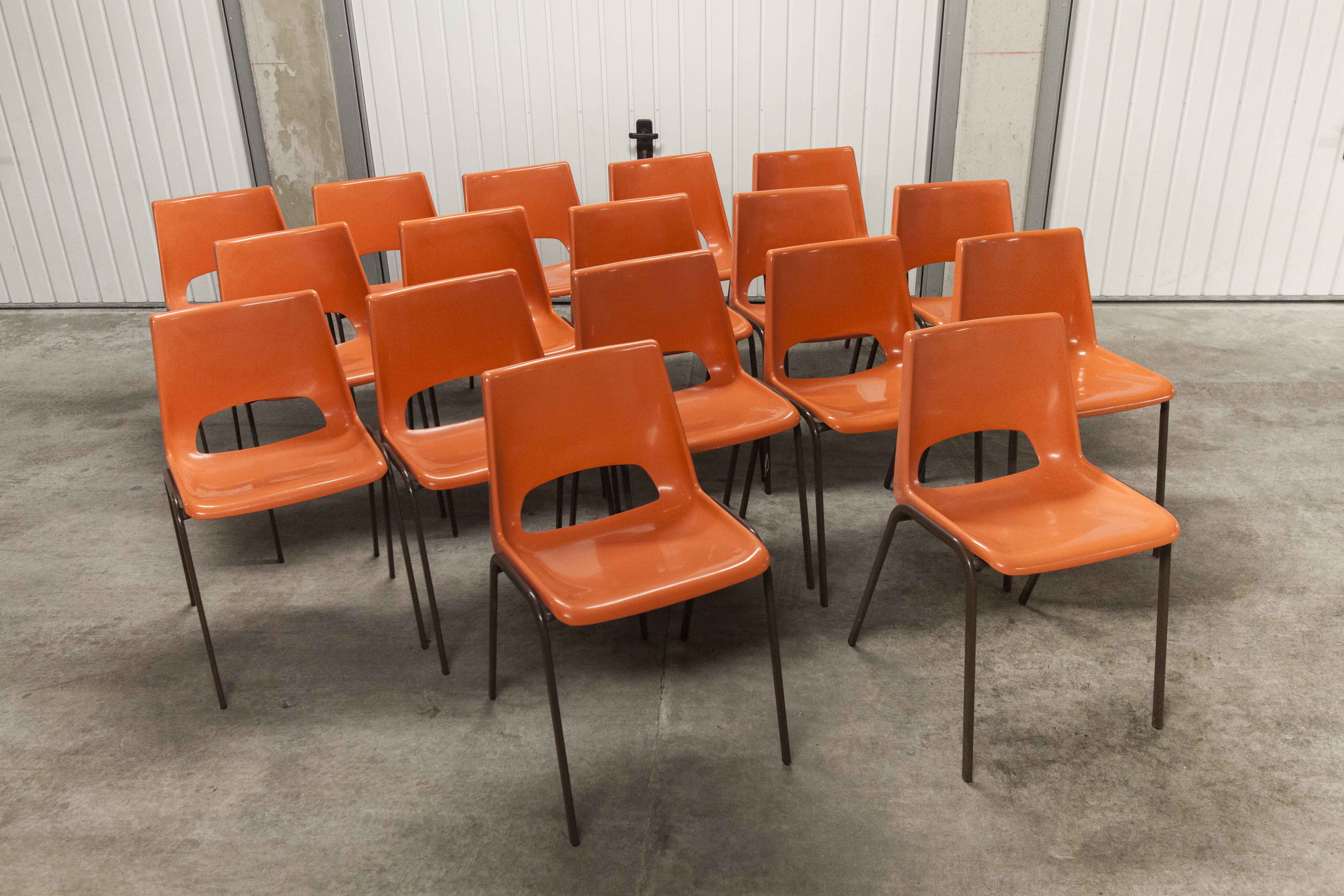 Set of 17 vintage orange chairs 1970