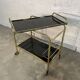 Vintage golden and black rolling service 1970s