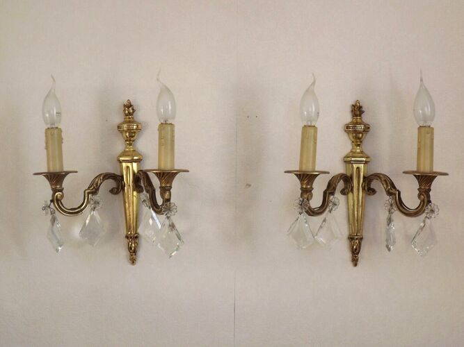 Pair of French empire brass double wall lights with diamond crystal drops