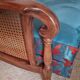 Bridge armchair in wood and cane from the 1950s.