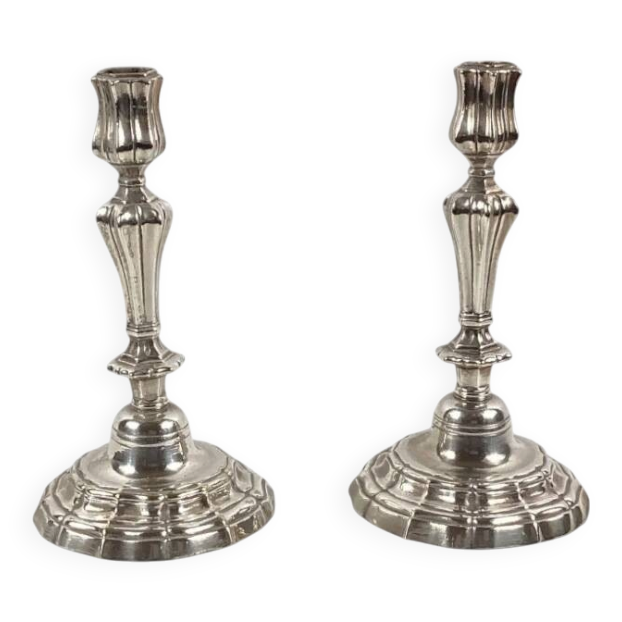 Pair of silvered metal candlesticks in the Louis XIV style.