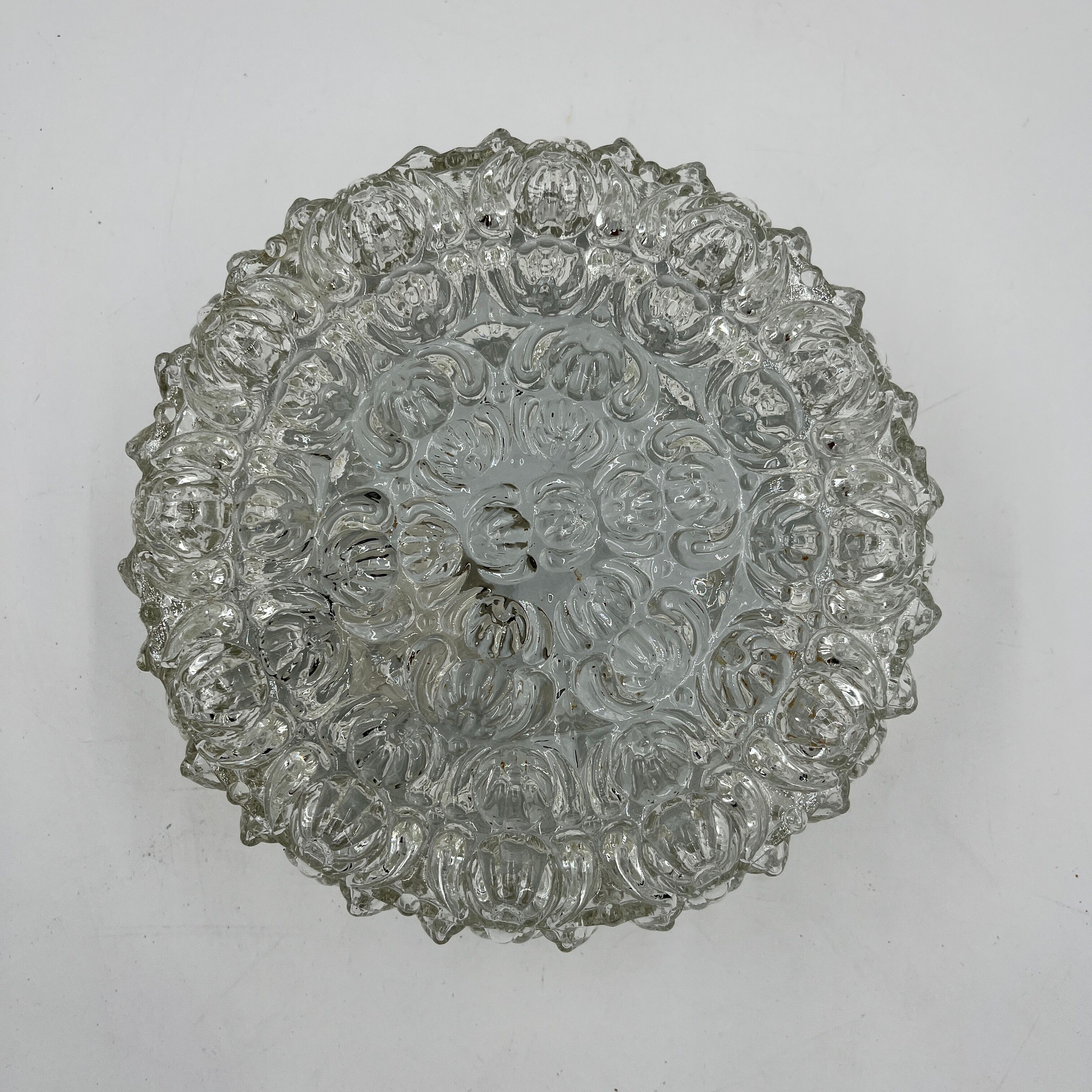 Cast glass ceiling lamp with relief