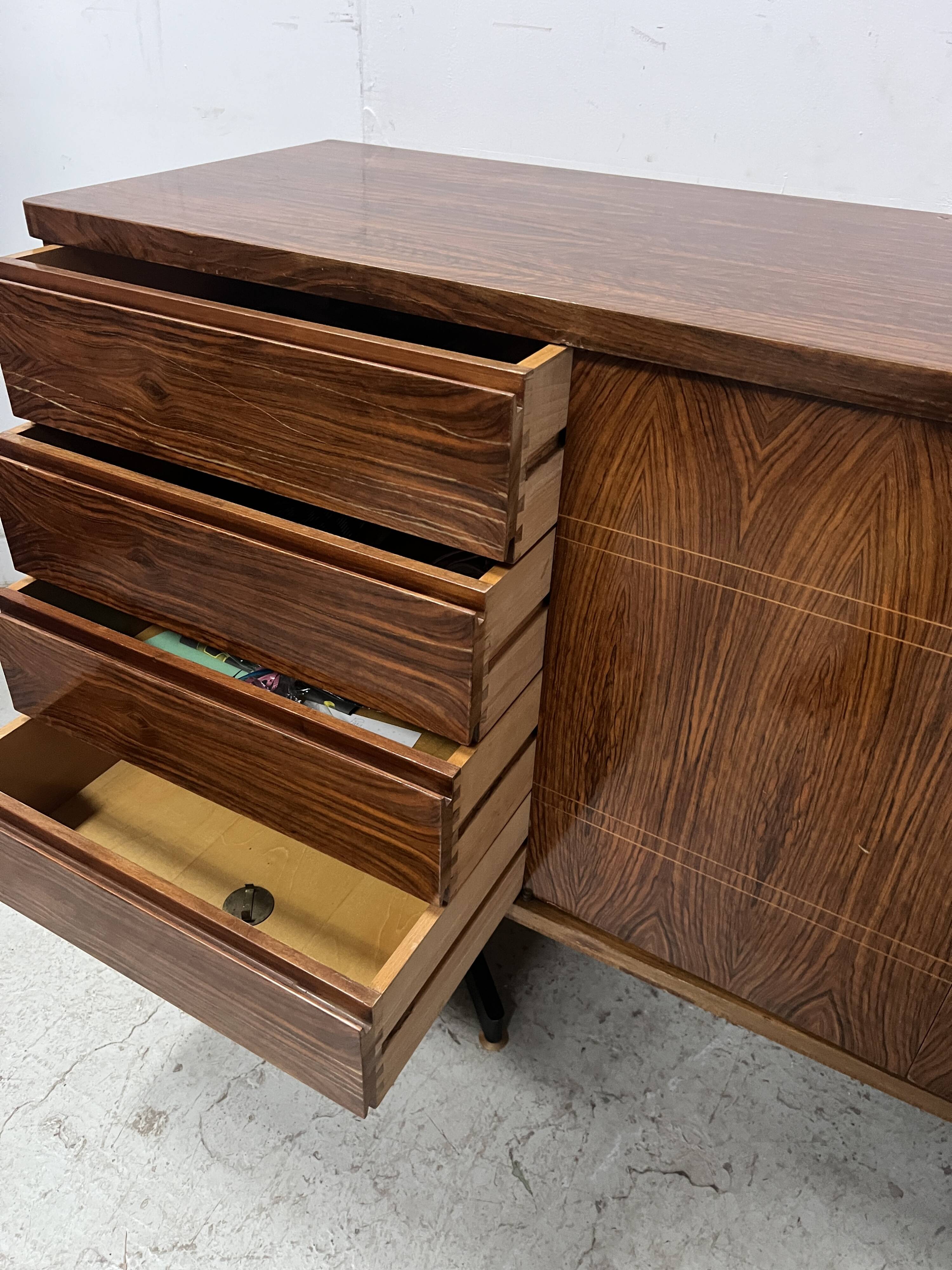 Scandinavian enfilade in veneered wood with iron legs, 20th century.