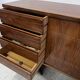 Scandinavian enfilade in veneered wood with iron legs, 20th century.