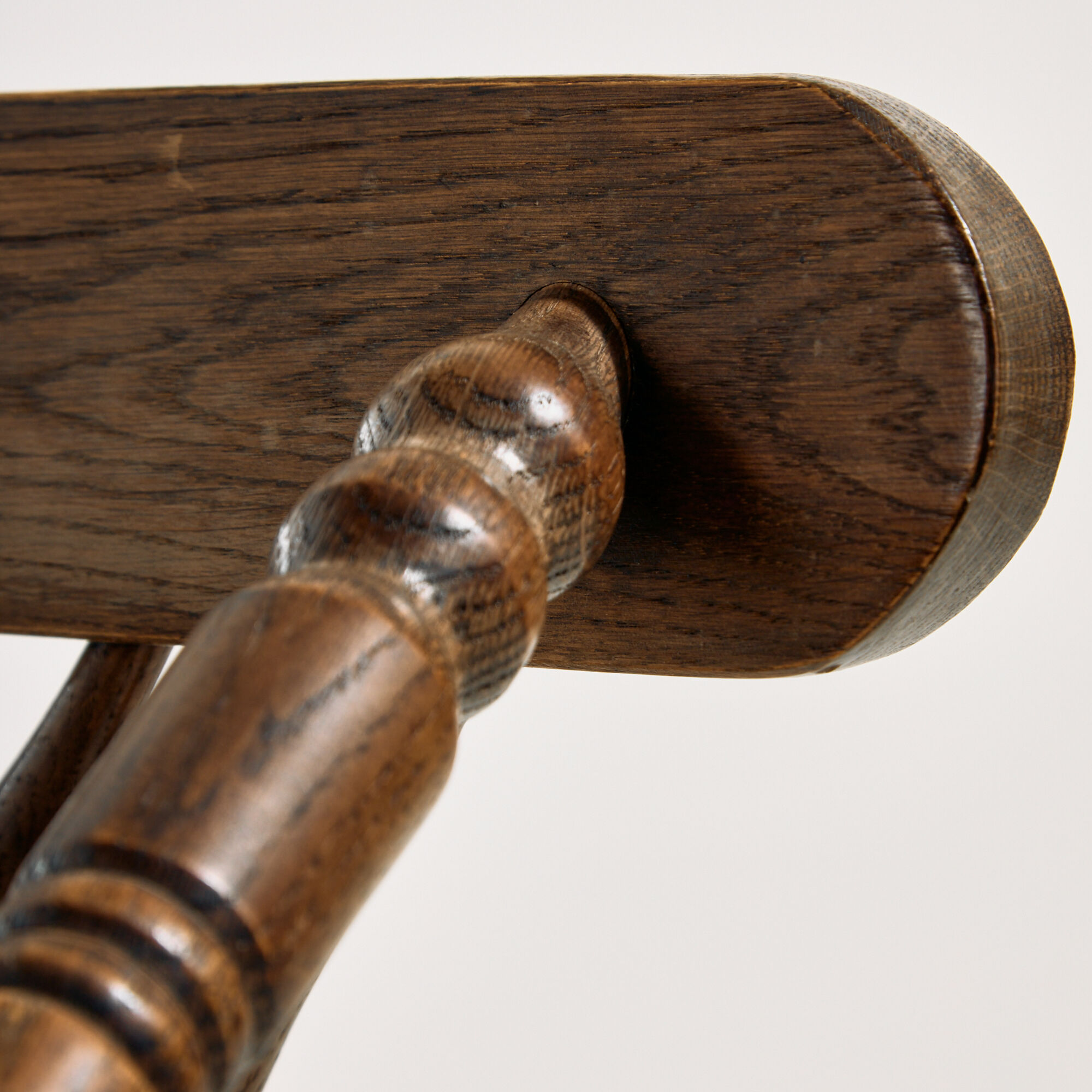 Oak armchair with three legs