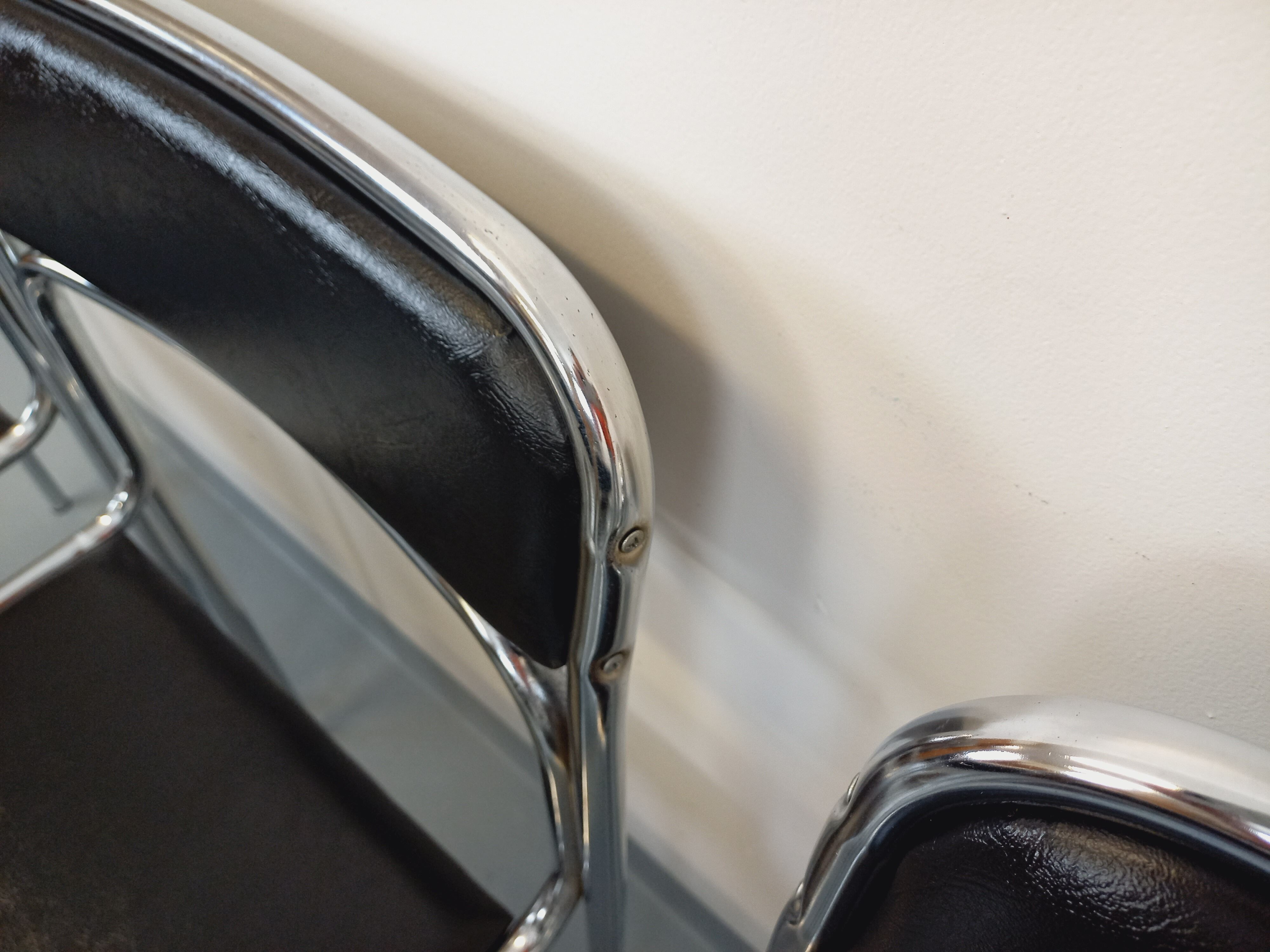Set of 6 vintage Italian stackable chairs in chrome metal and skai.