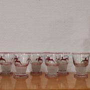 Glasses and carafe decorated with red Christmas reindeer and white granita 60's
