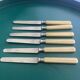 6 silver and ivory dessert knives